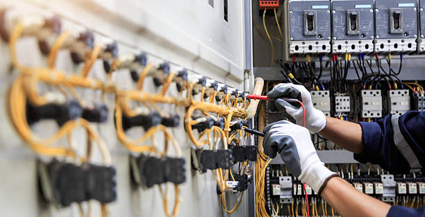 Professional Electrician technician working in Brookwood, AL